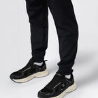 Pantaloni uomo in nylon stretch con polsini a costine c-tech